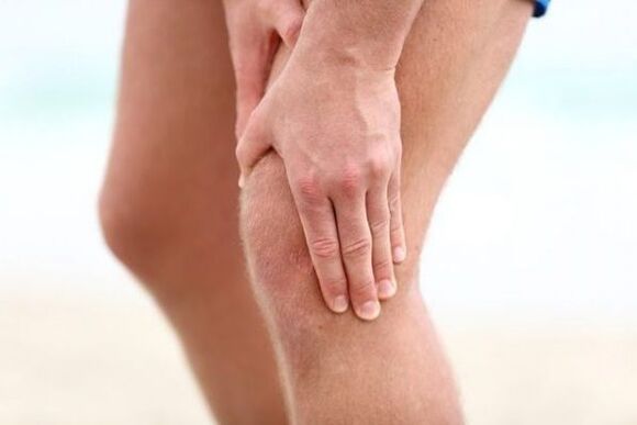 Pain in the knee joint with arthrosis